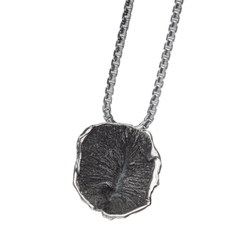 Small butthole pendant by Alligator Jesus