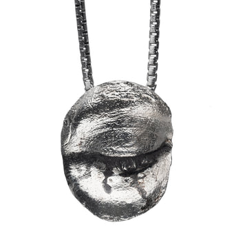 The Closed Eye Pendant by Alligator Jesus